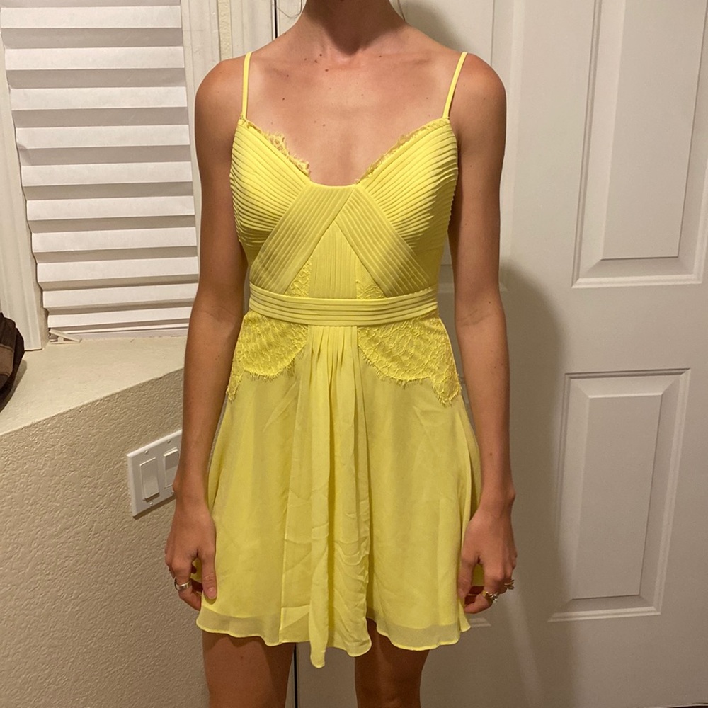 Yellow mini dress. BCBG.